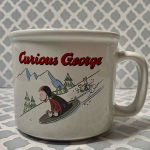 Curious George mug, George goes sledding